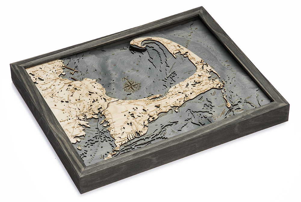 Cape Cod, Massachusetts wood chart map made using dark green and natural wood on white background laying flat