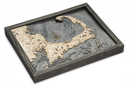 Cape Cod, Massachusetts wood chart map made using dark green and natural wood on white background laying flat