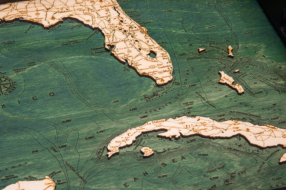 Gulf of Mexico serving tray made using green and natural colored wood up close