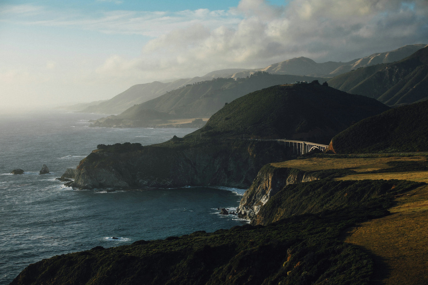 The Big Sur coastline of California with Bixby Creek Bridge and cliffs above the Pacific