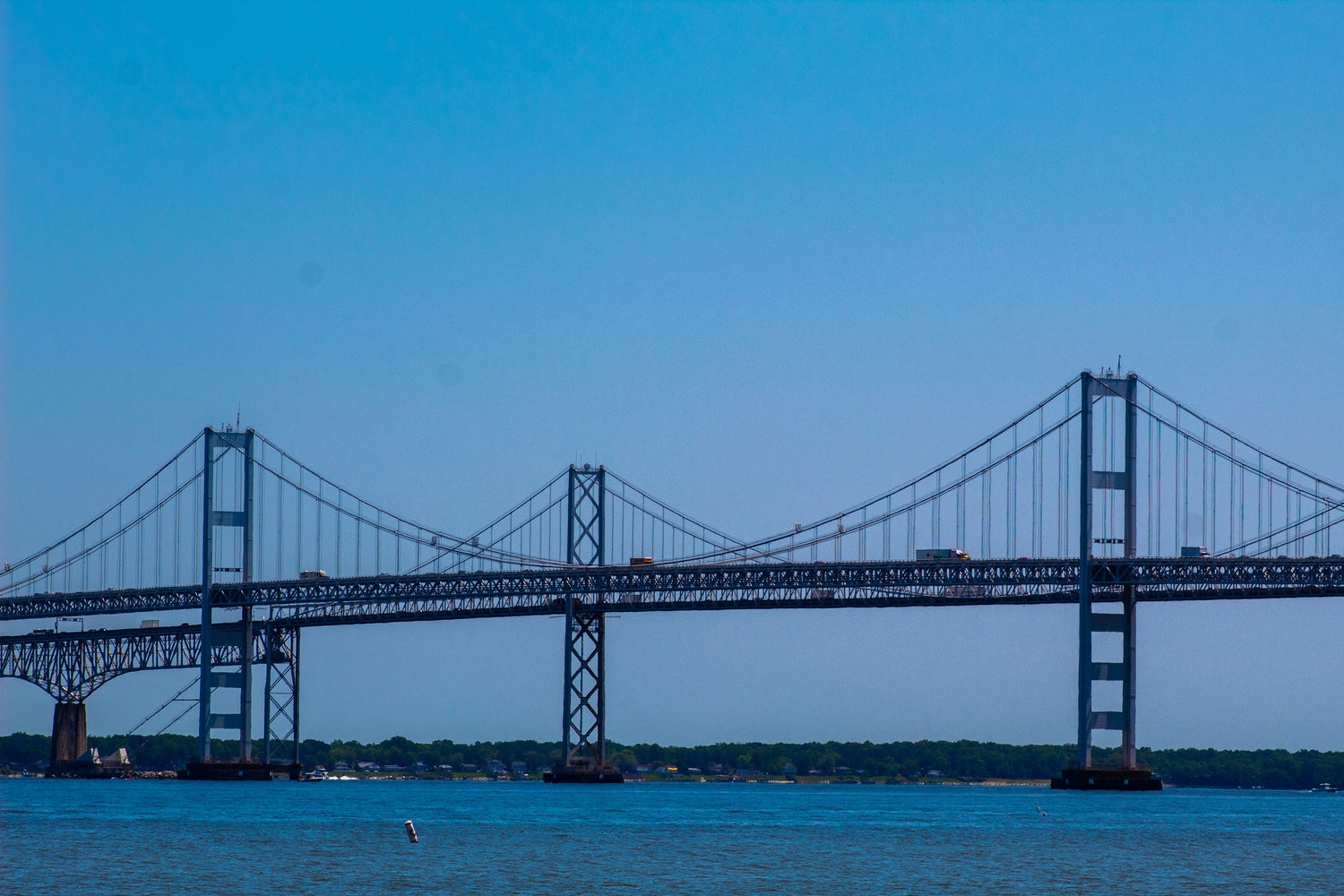 The Chesapeake Bay Bridge spanning blue water near Annapolis, Maryland