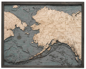 3-D Wood chart of Alaksa in black frame on white background